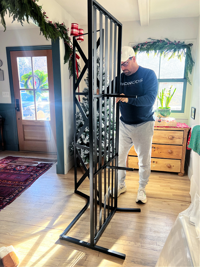 Mike putting together our new outdoor sofa.