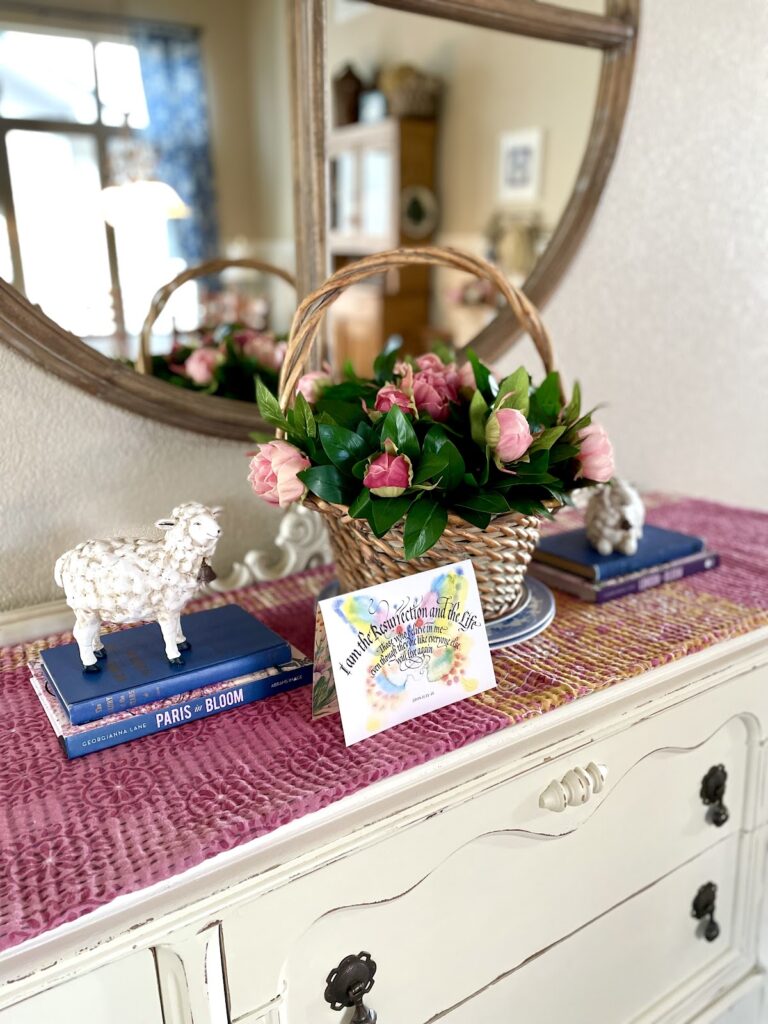 Pink flowers in basket for Tuesdays With Tracy March Blog