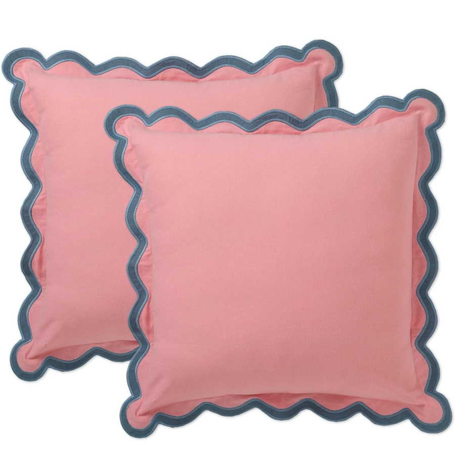 Pink scalloped pillow with blue trim for Valentine's Day Bed