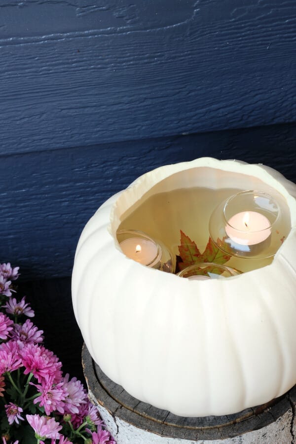 A pumpkin with floating votives!