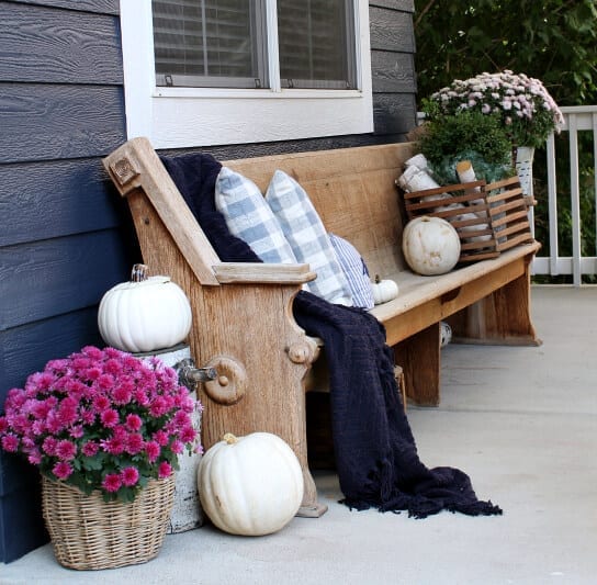 A pink and purple Fall porch with navy and white accents!