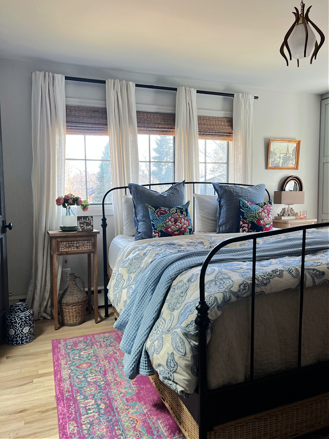 Adding a pink patterned rug to our master bedroom gave it the much needed color I was hoping for!