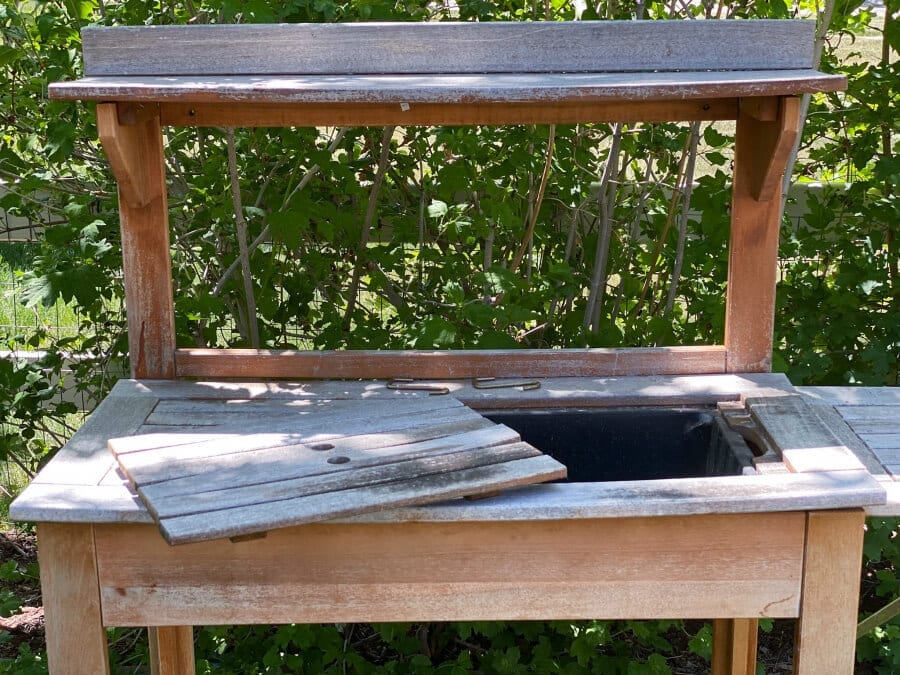 This old weathered potting bench was in need of a major makeover. Come see it now!