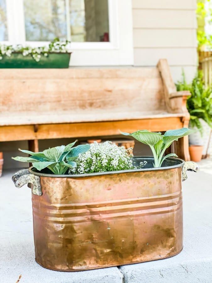 WHy not use a copper boiler for some plants on your porch?