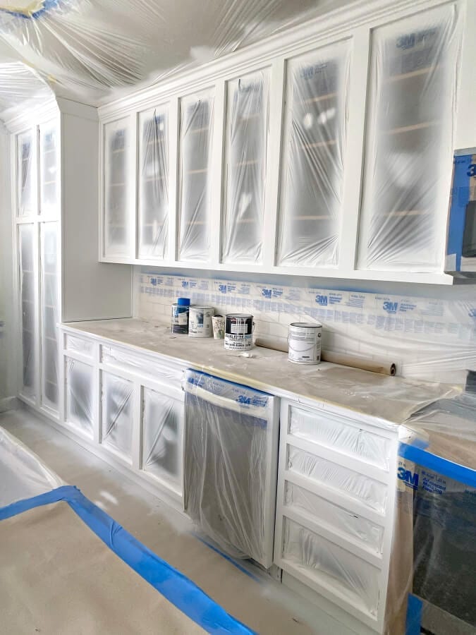 A view of our cabinet boxes after they were primed and painted and waiting for the doors.