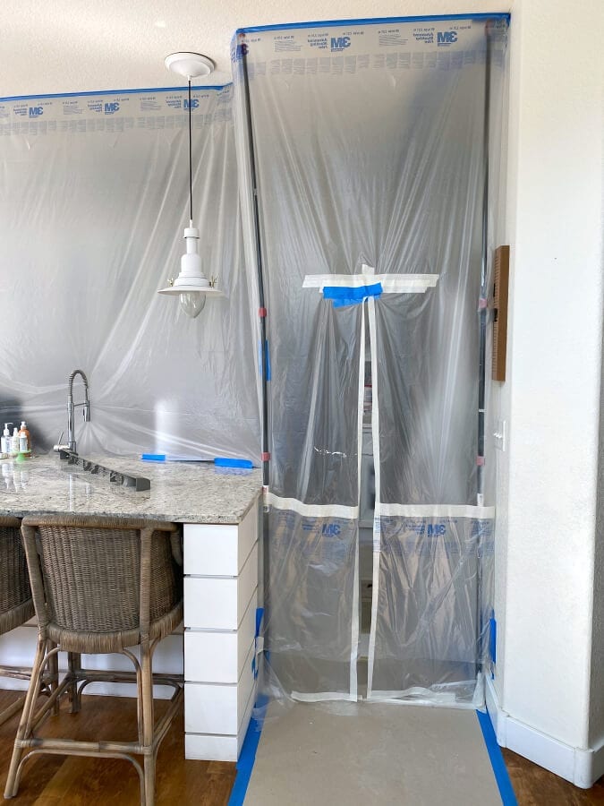 Our kitchen was taped off and properly taped and sealed to protect it from the new cabinet paint.