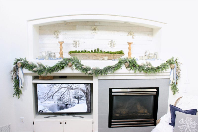 A rustic and elegant Christmas mantel.