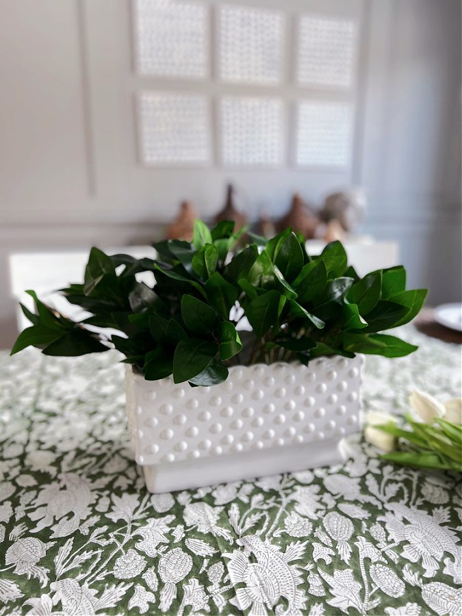 Greenery in white hobnail planter