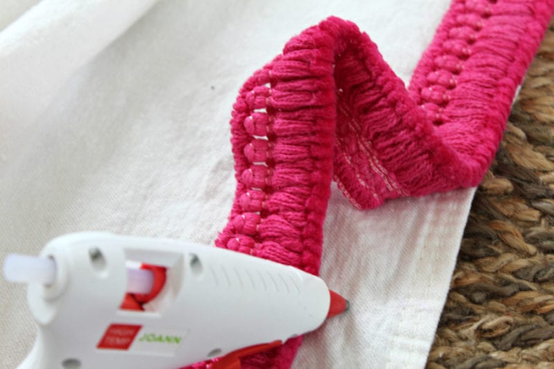 Adding trim to curtains can be simple with the help of a glue gun.