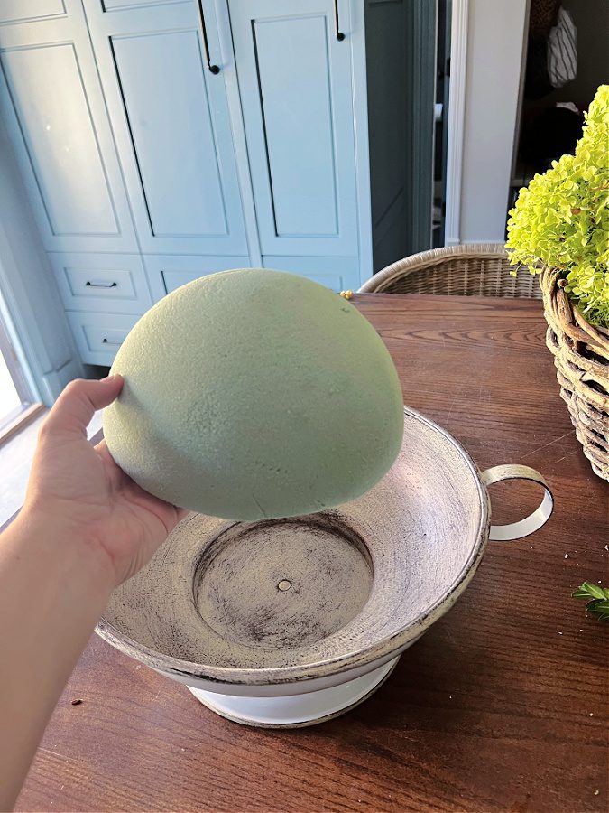 Floral foam in the bottom of the pedestal bowl