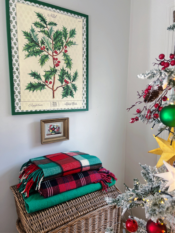 plaid blankets stacked on basket for Christmas
