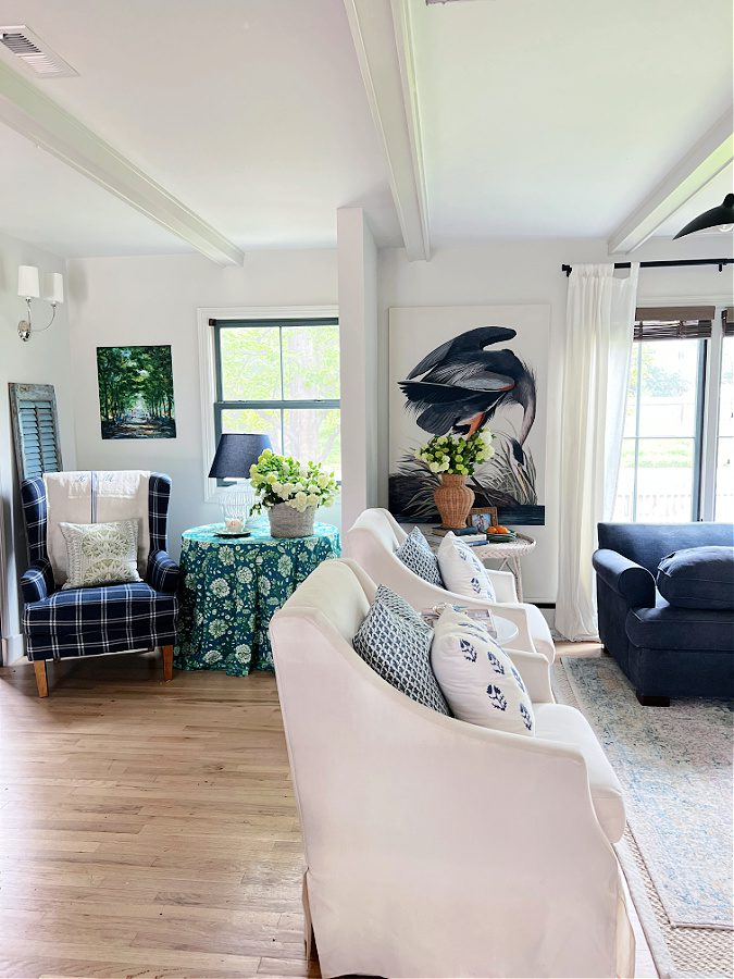 A look in to our seating area, white chairs and coastal bird art.