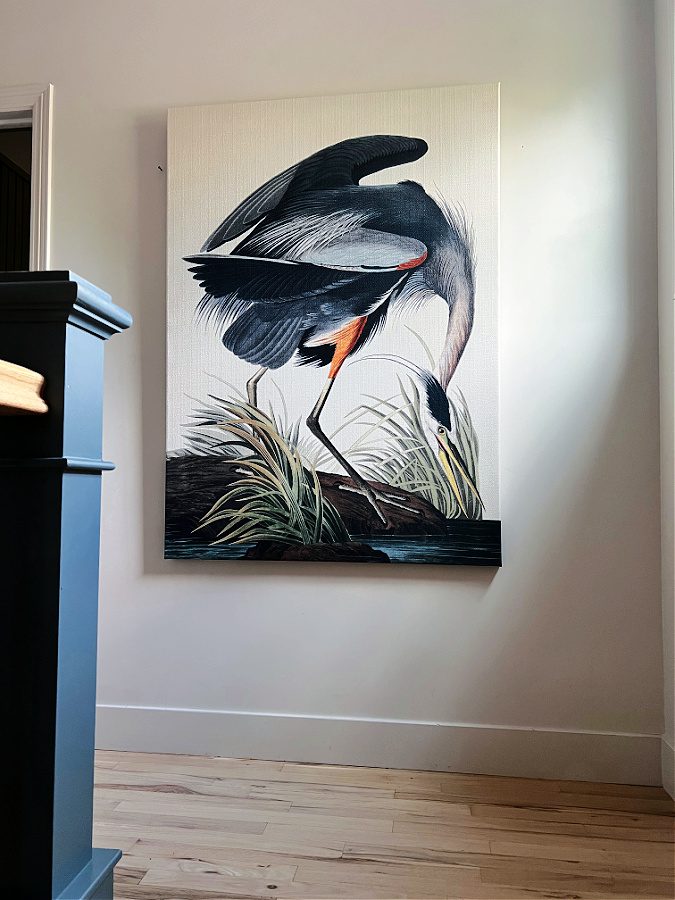 Large wrapped canvas art of blue herron at the op of our stairs