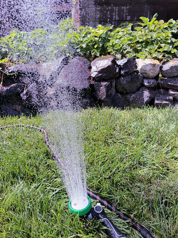 hose nozzle turned into sprinkler