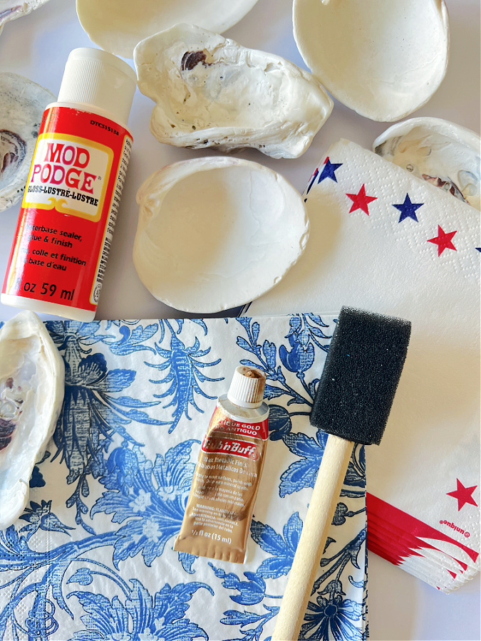 supplies needed to mod podge sea shells for decor with patriotic theme