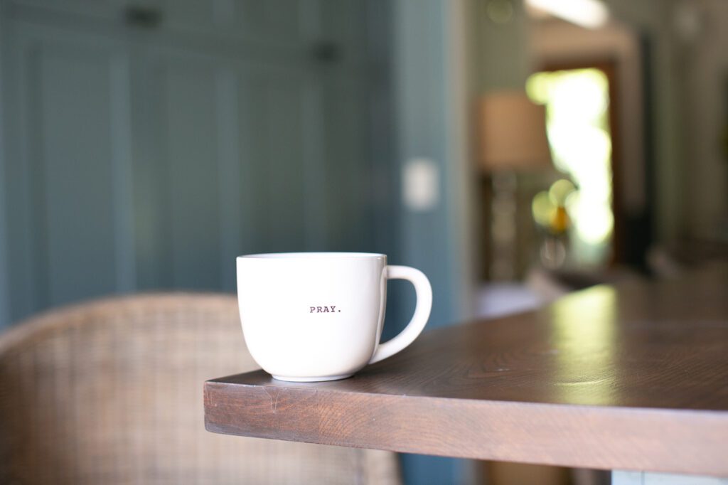 pray mug on our butcher block counter