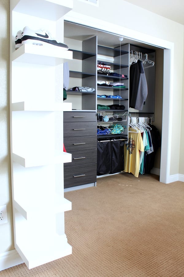 We are leaving the closet doors off of this teen boy closet makeover.