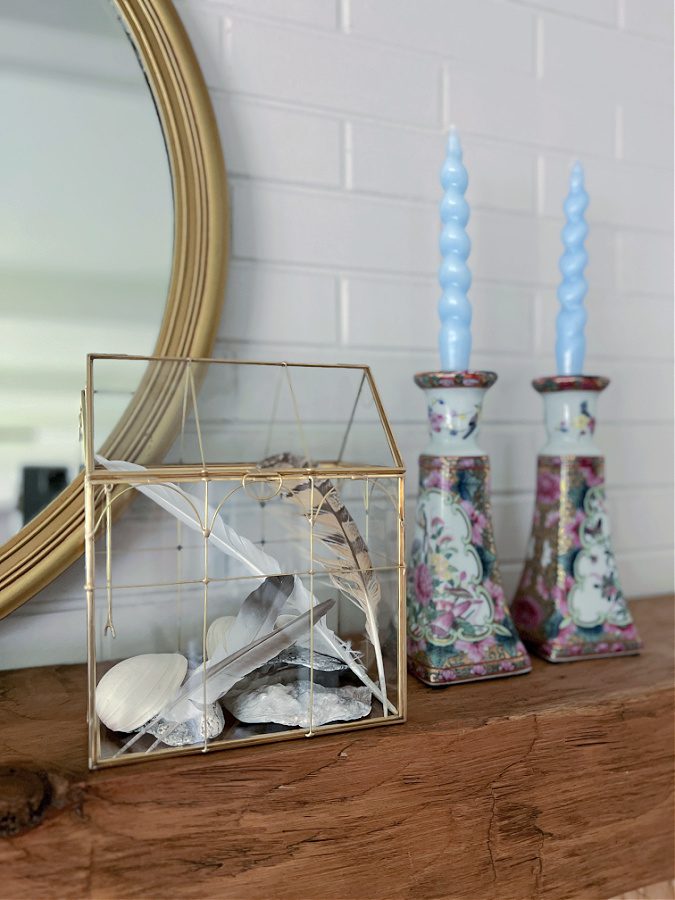 glass terrarium on mantel