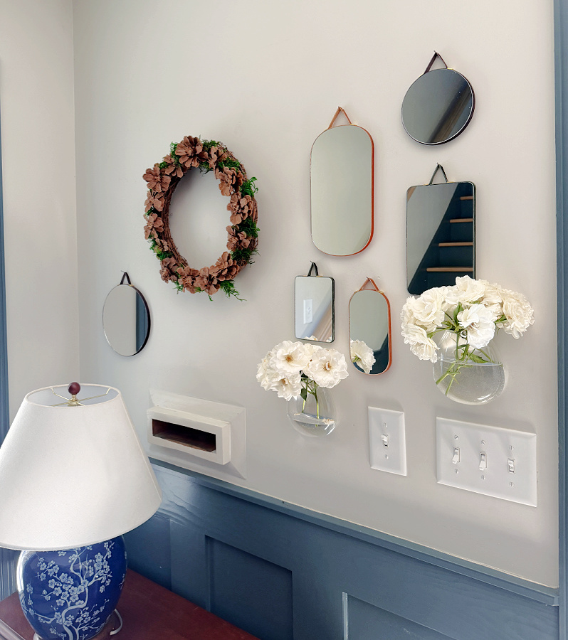 wall vases with mirrors and roses