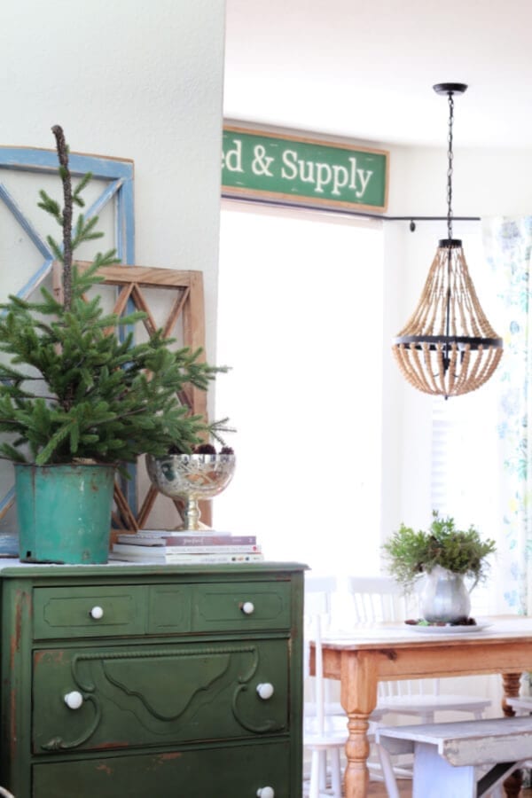 Blues, greens and live greenery make this winter kitchen cozy and pretty!