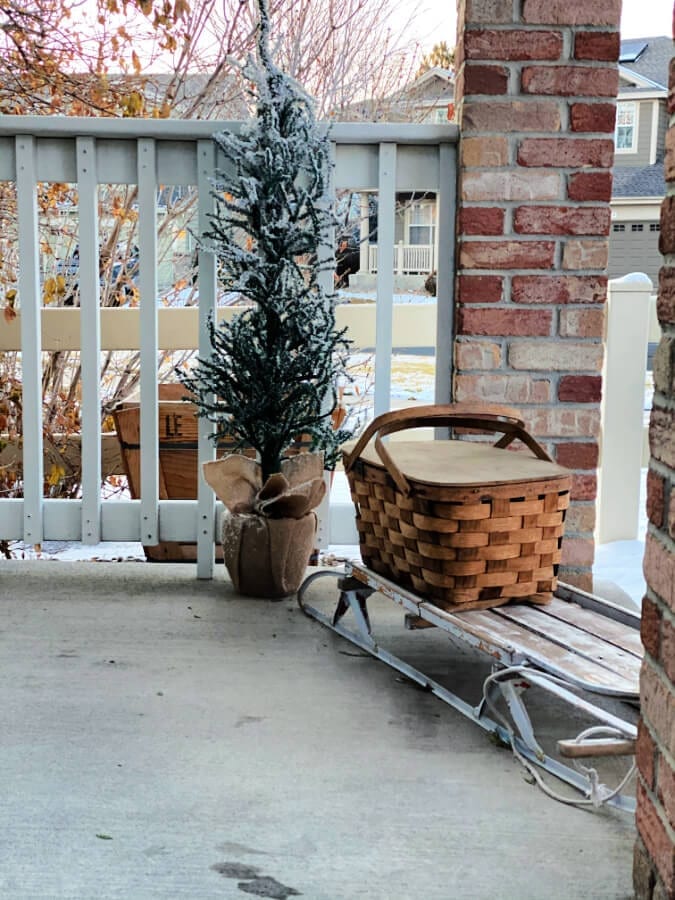 Winter porch decorating ideas that include vintage decor.