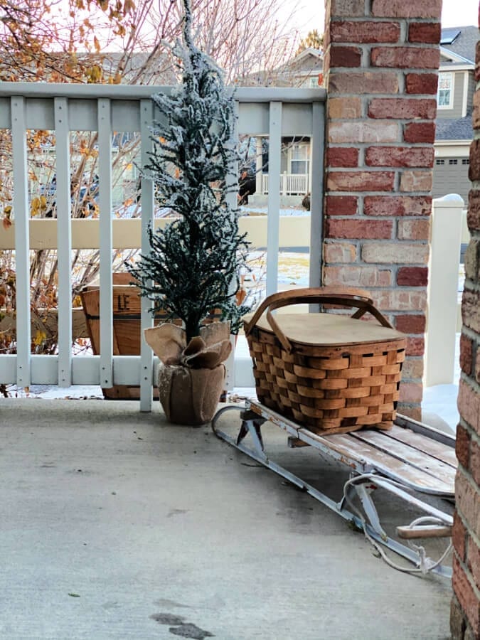 Keeping It Cozy: A Porch for Winter  Pine cone decorations, Front porch  decorating, Winter decor